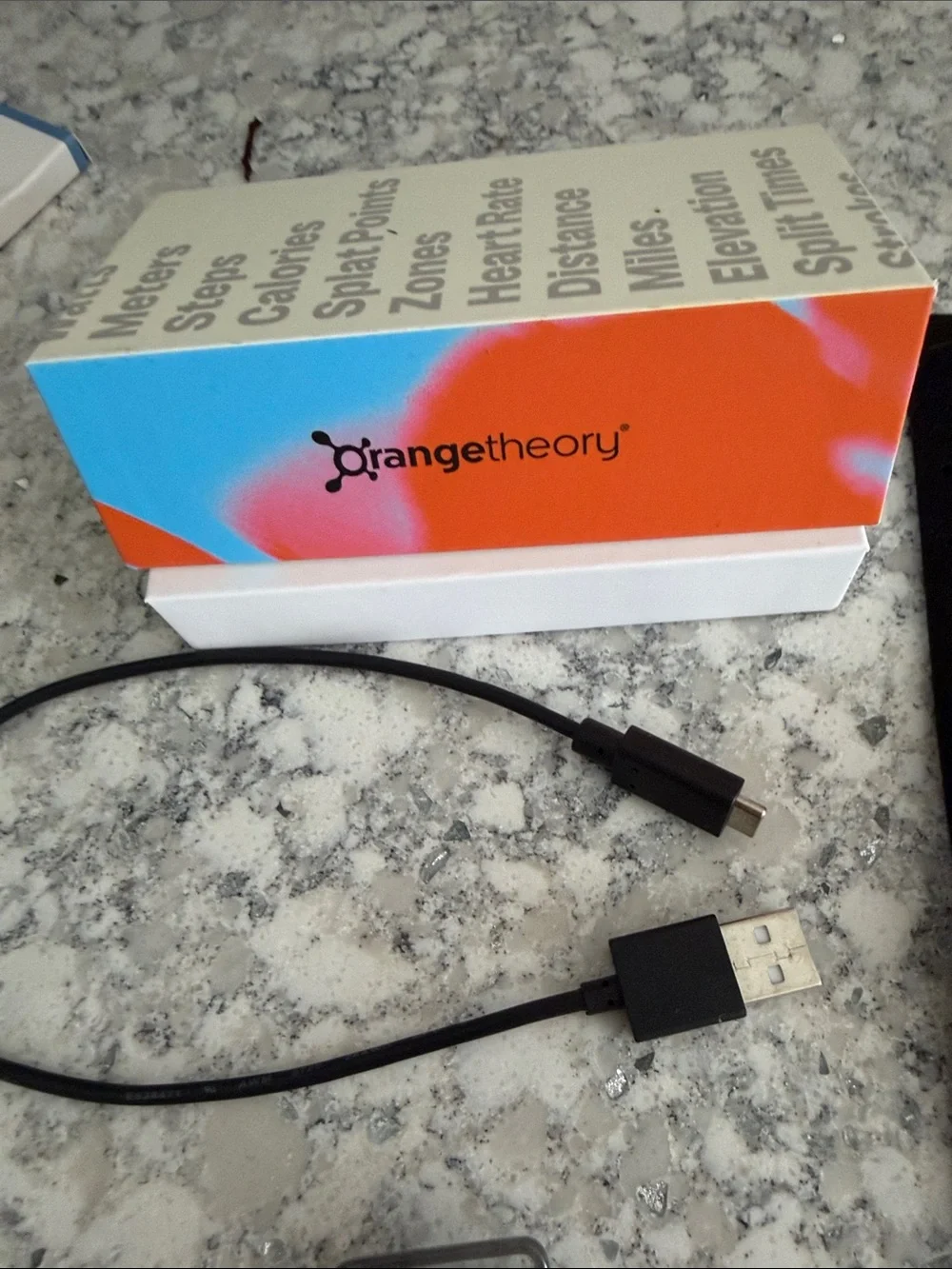 Orangetheory Tracker with Black, Orange, and Blue Interchangeable Bands
